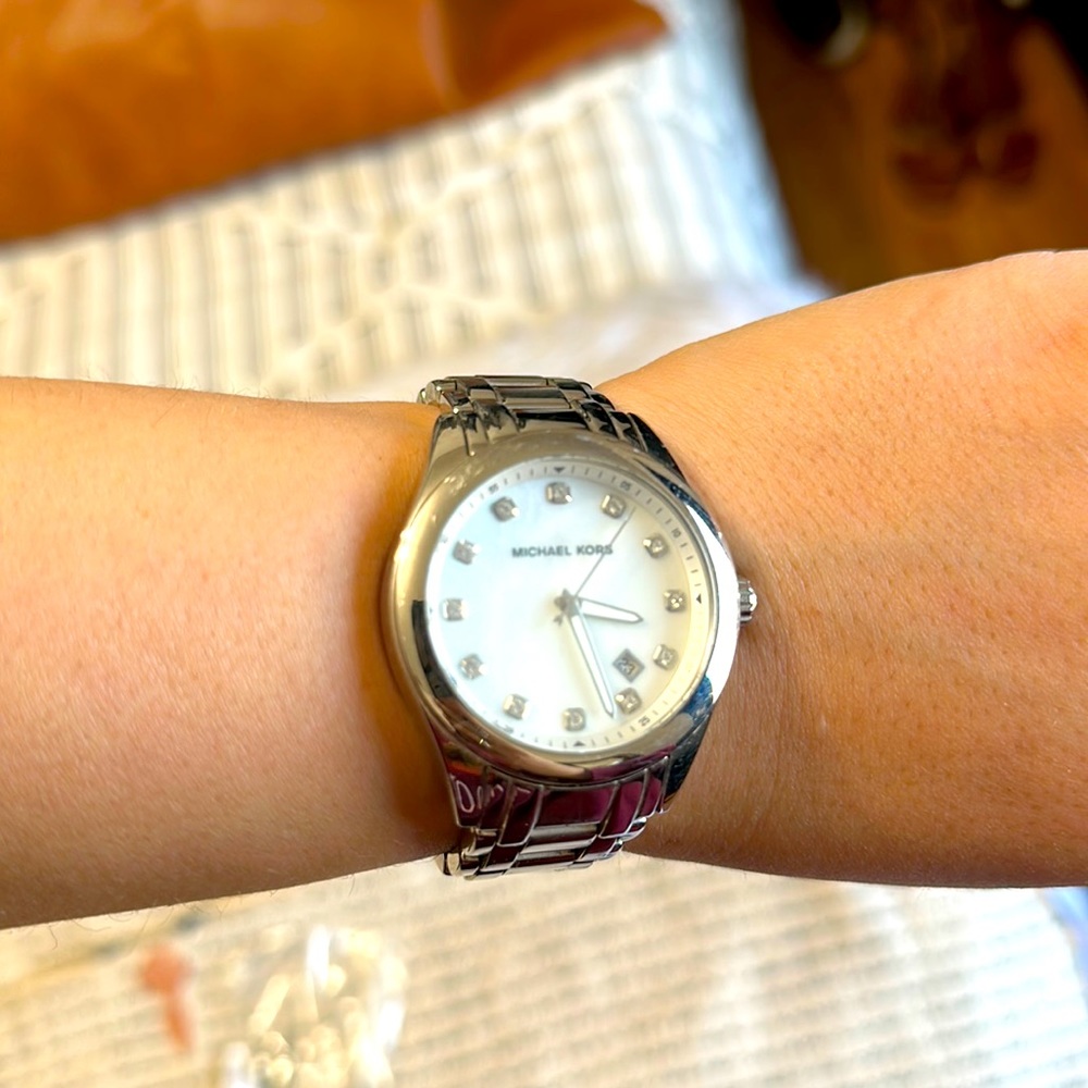 Michael Kors stainless steel watch with a multicolored pearl face